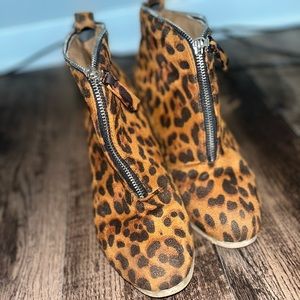 Cheetah booties with zipper up the front.